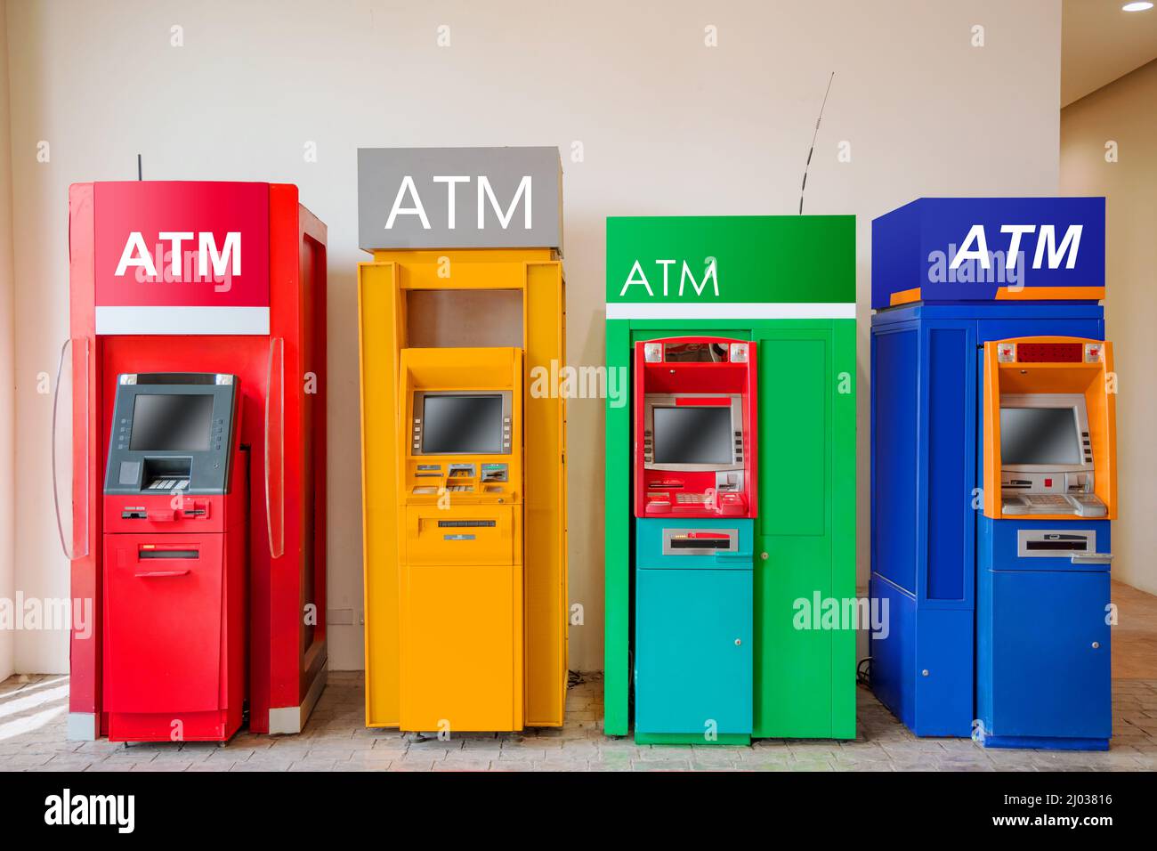 ATM machine banking cash money withdraw service at public place multiple bank. Stock Photo