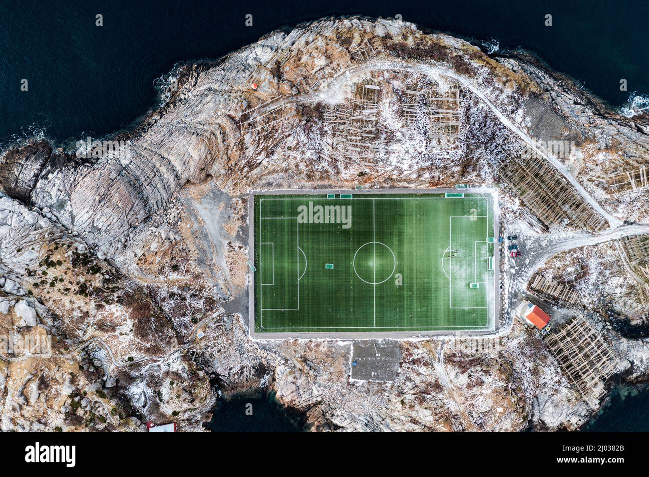 Football field on islet from above, aerial view, Henningsvaer, Nordland