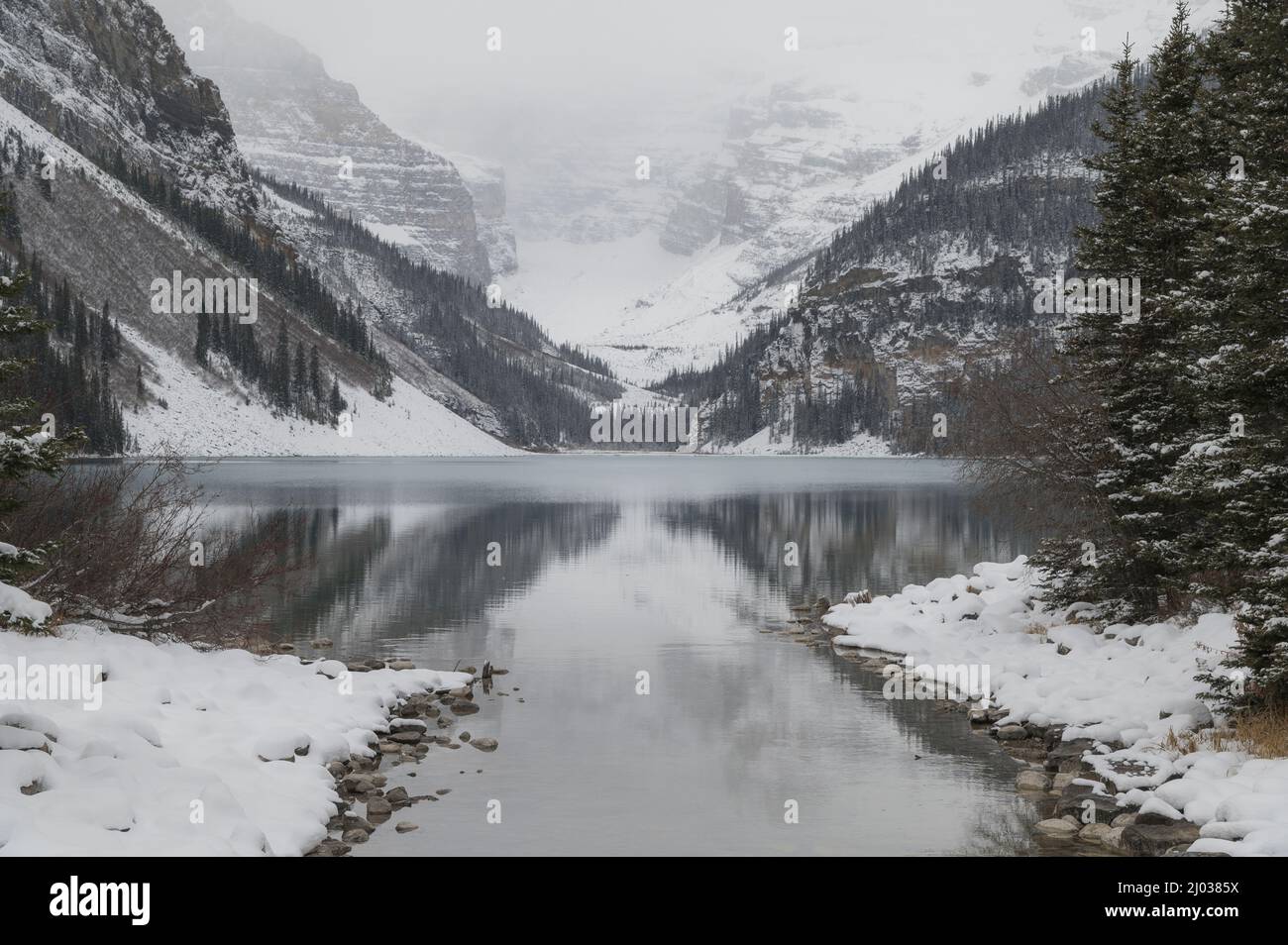 Winter at Lake Louise with snow-covered mountains, Banff National Park ...