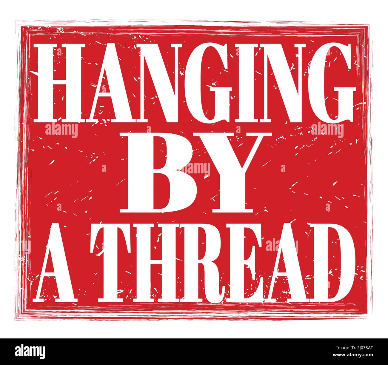 HANGING BY A THREAD, written on red grungy stamp sign Stock Photo Alamy