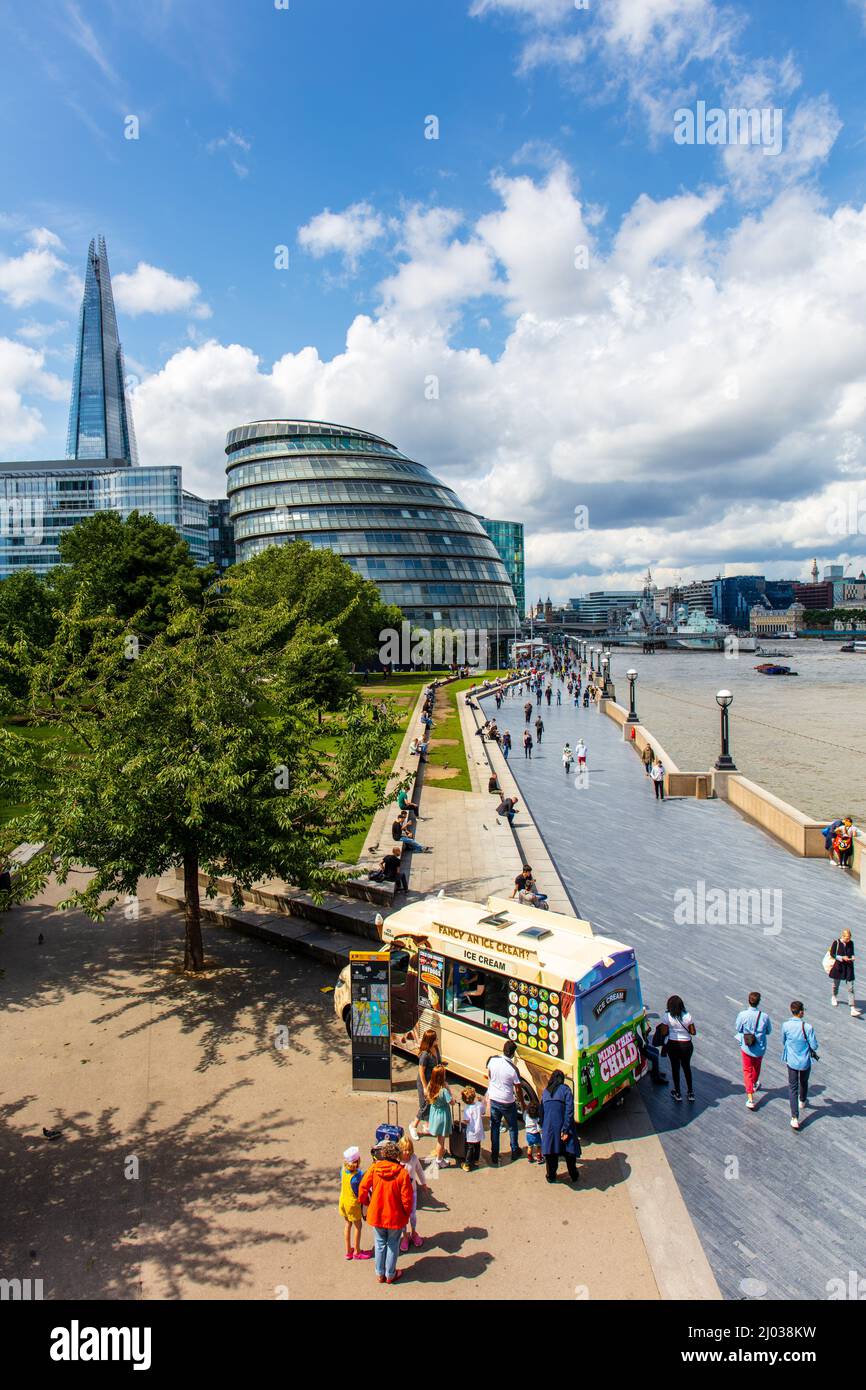 People buying ice cream by Potters Fields Park next to River Thames and The Shard, London, England, United Kingdom, Europe Stock Photo