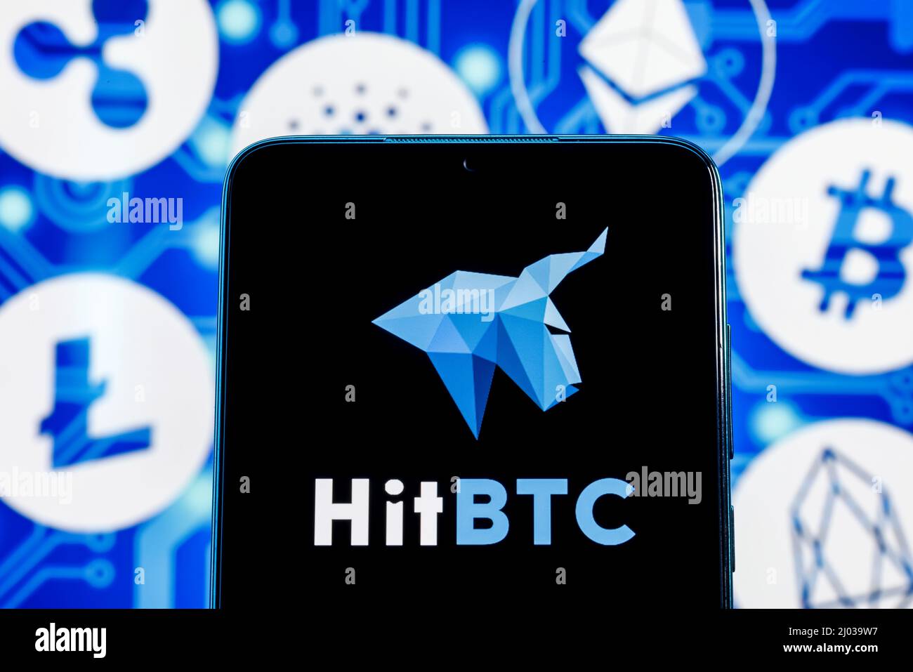 HitBTC is cryptocurrency exchange. HitBTC logo on smartphone screen against  the background of the main cryptocurrencies Stock Photo - Alamy
