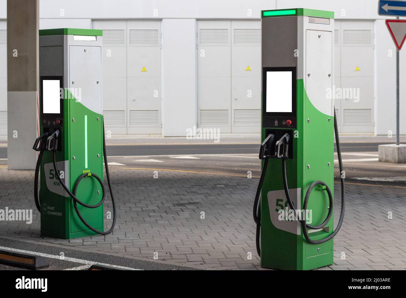 Public charging station for charging the battery of modern electric vehicles with mockup Stock