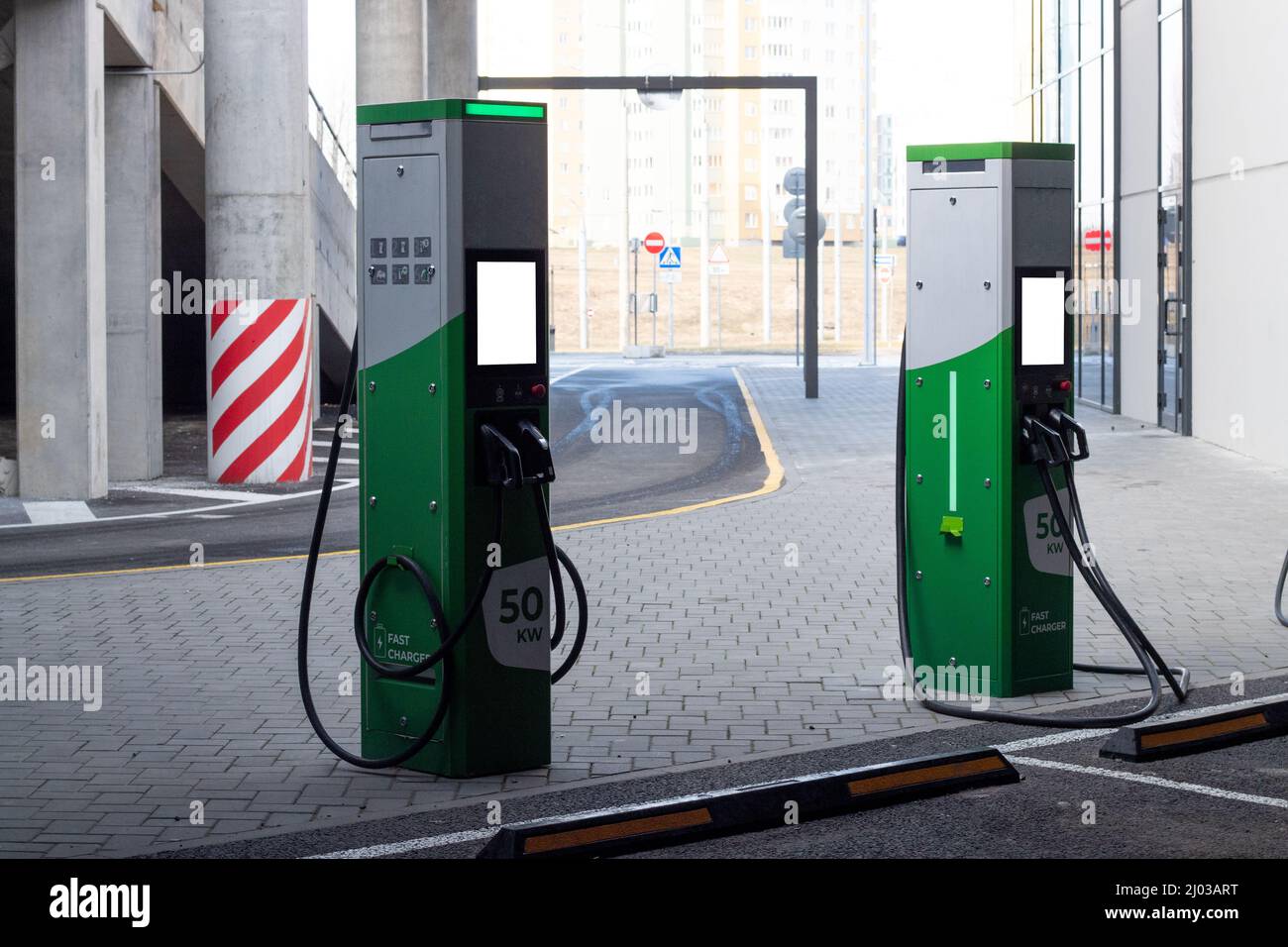Public charging station for charging the battery of modern electric vehicles with mockup Stock