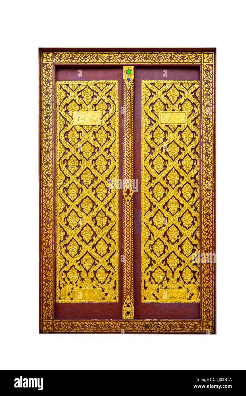 Thai style temple door wooden engraving hand craft golden color Stock Photo