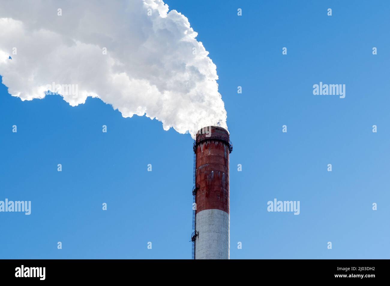Industrial smoking pipes close up of various types of thermal power