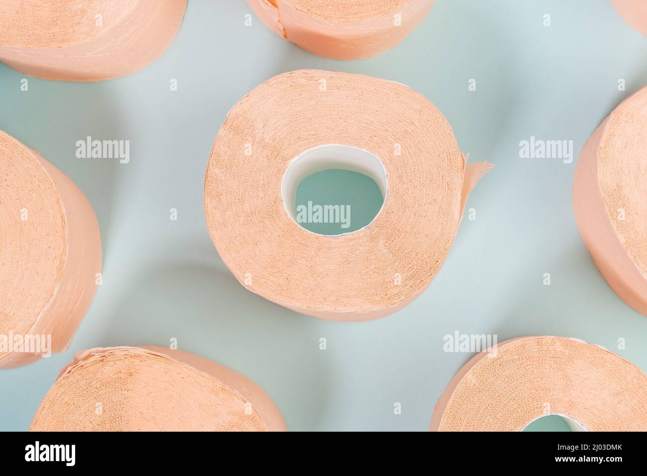 Toilet paper orange color top view. Hygiene concept Stock Photo Alamy