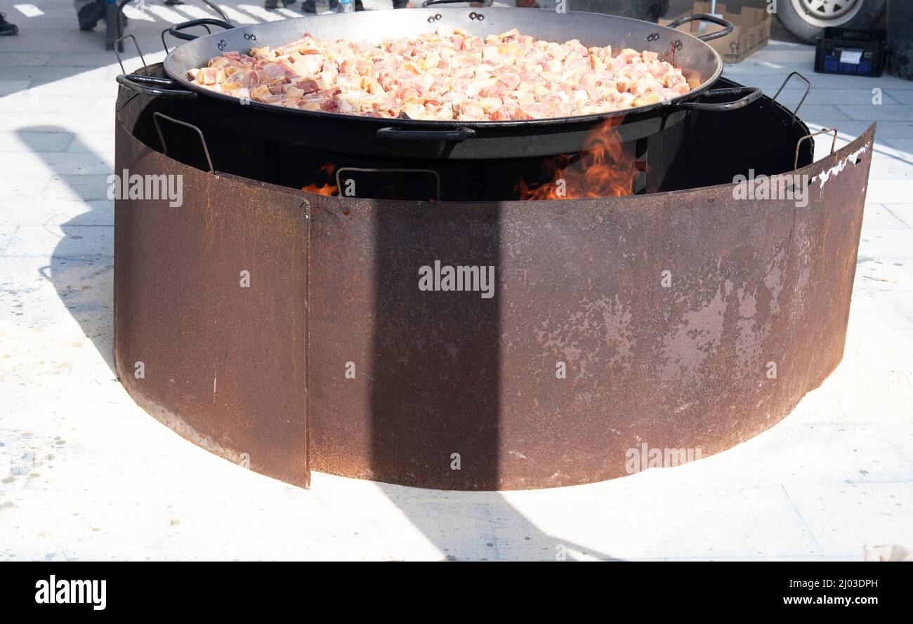 cooking big dish of paella open fire,Spain Stock Photo Alamy