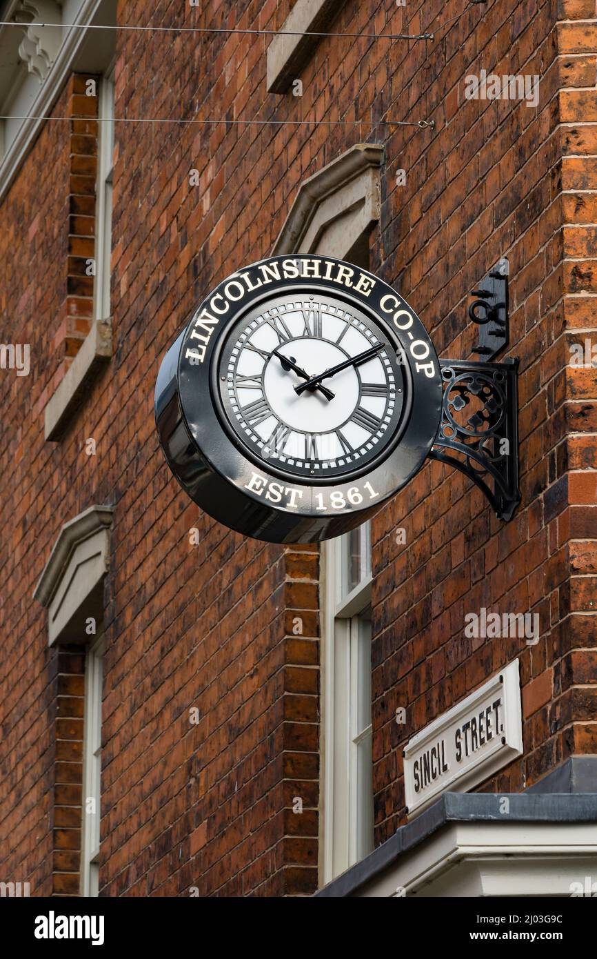 Lincolnshire CO-OP wall clock in Sincil Street Lincoln city 2022 Stock Photo