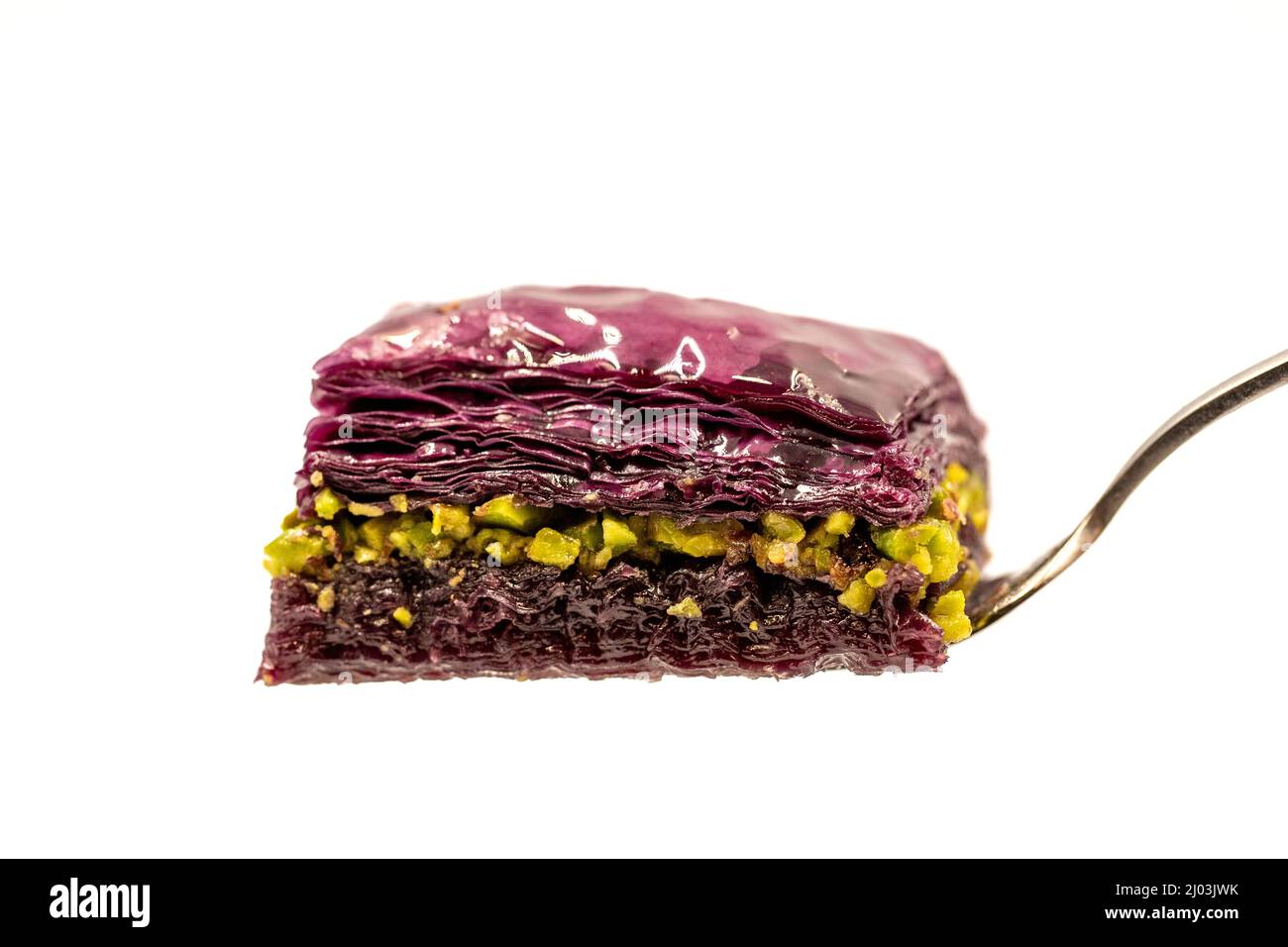 Pistachio Purple baklava (violet baklava). Traditional Middle Eastern Flavors. Local name Mor Baklava. close up. Stock Photo