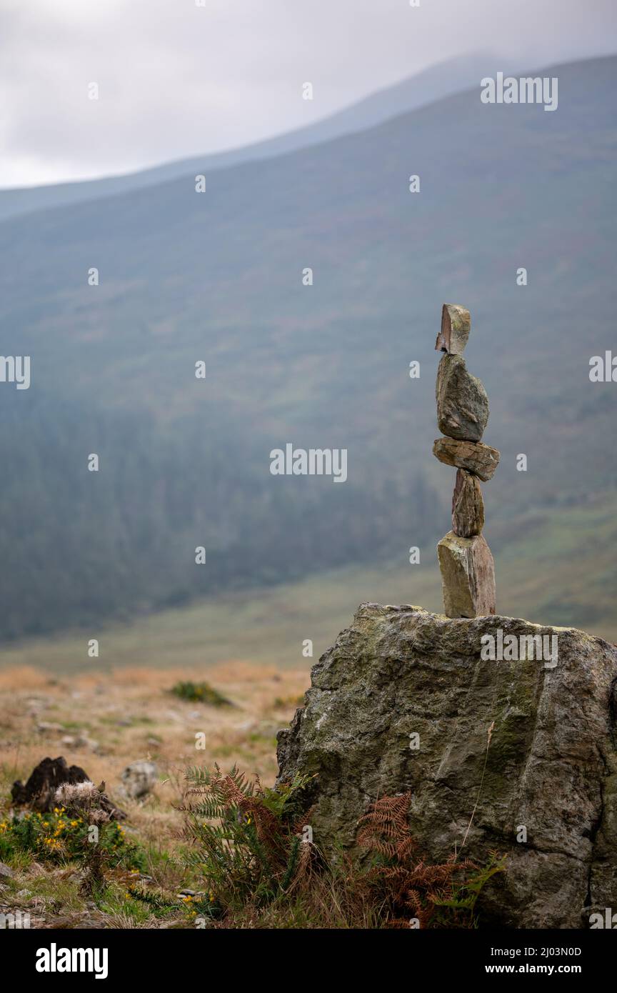 Beautiful shot of stone stack on a top of a mountain Stock Photo - Alamy