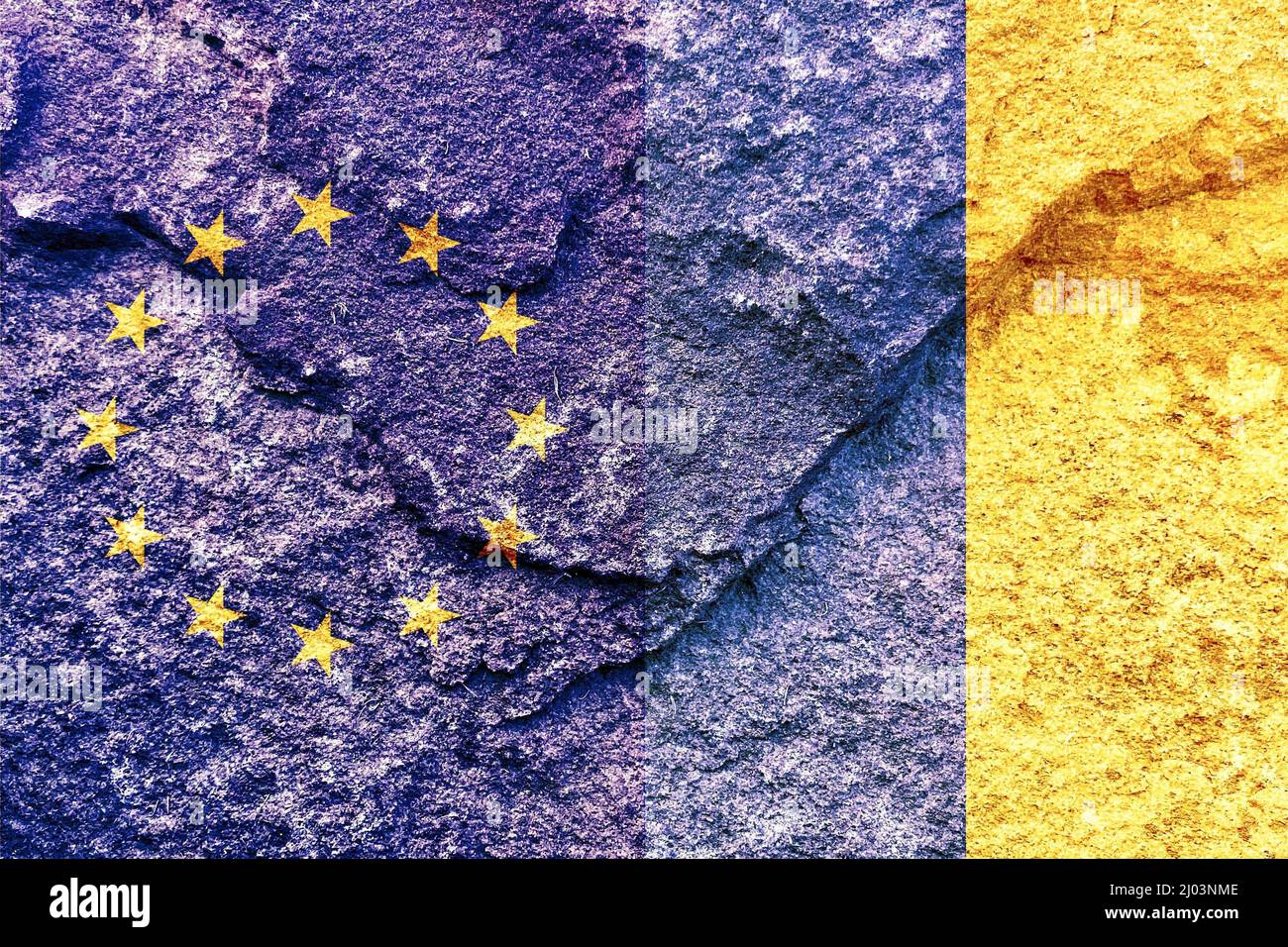 Vintage EU and Ukraine vertical national flags isolated together on solid rock wall background Stock Photo