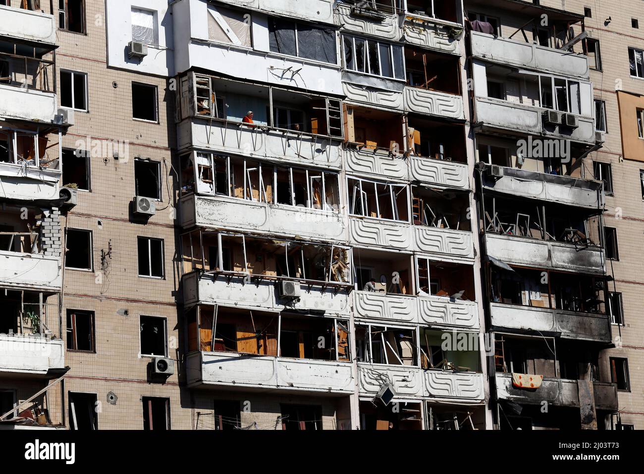 General view of a badly damaged residential building that was hit by a ...