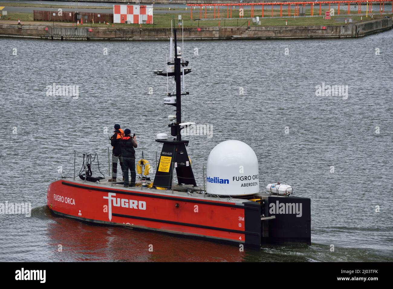 Fugro Orca Uncrewed Surface Vessel (USV) testing in the KGV Dock in East London prior to attending the Oceanology International trade event Stock Photo