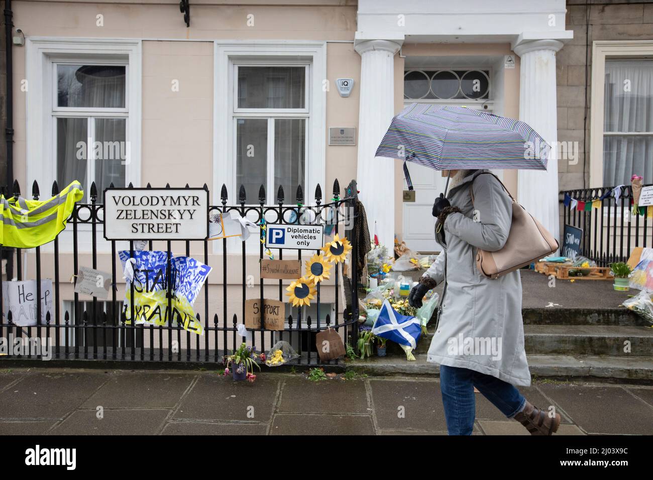 Edinburgh, UK. 16th Mar, 2022. People walk past messages of support left outside the Ukrainian Consulate in Edinburgh. Scotland. Pic Credit: Pako Mera/Alamy Live News Stock Photo