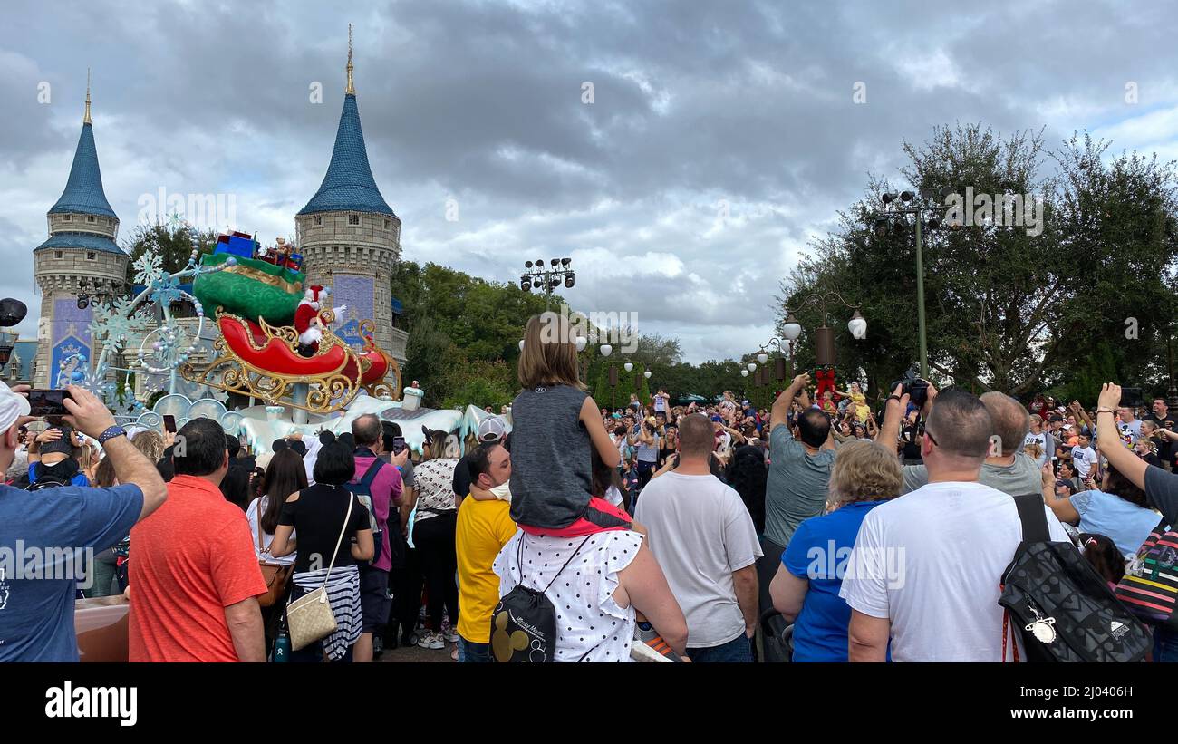 Orlando, FL USA -December 28, 2019:  People waiting to see the Christmas Parade with Santa Claus in Magic Kingdom at  Walt Disney World  in Orlando, F Stock Photo