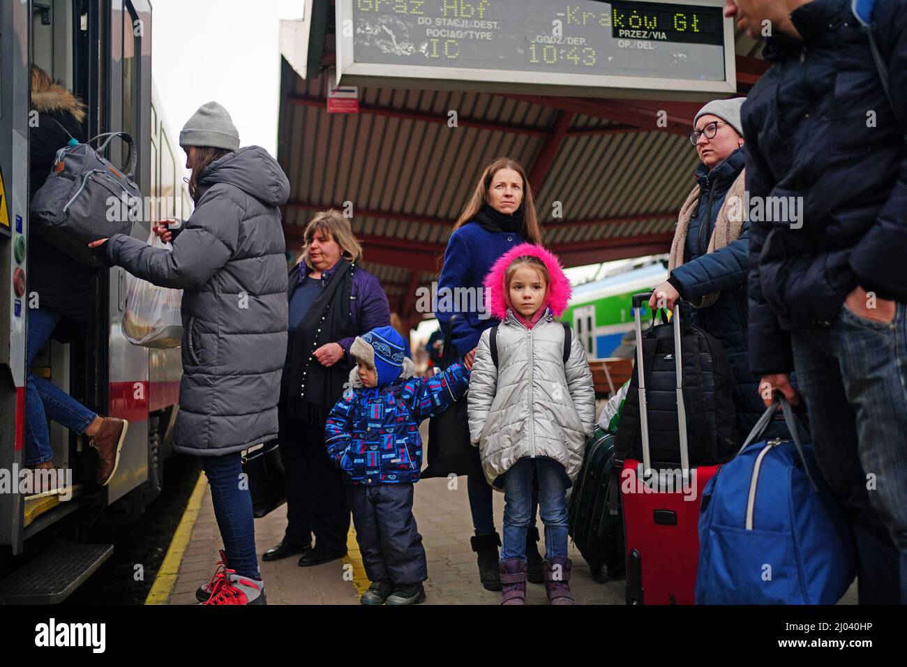 A family from Ukraine board a train at Przemysl train station in Poland. Picture date: Wednesday March 16, 2022. Stock Photo