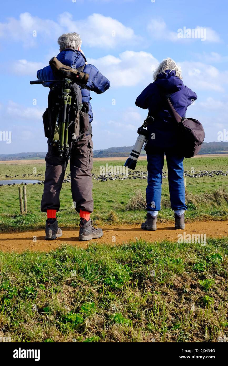 birdwatchers at cley-next-the-sea, north norfolk, england Stock Photo