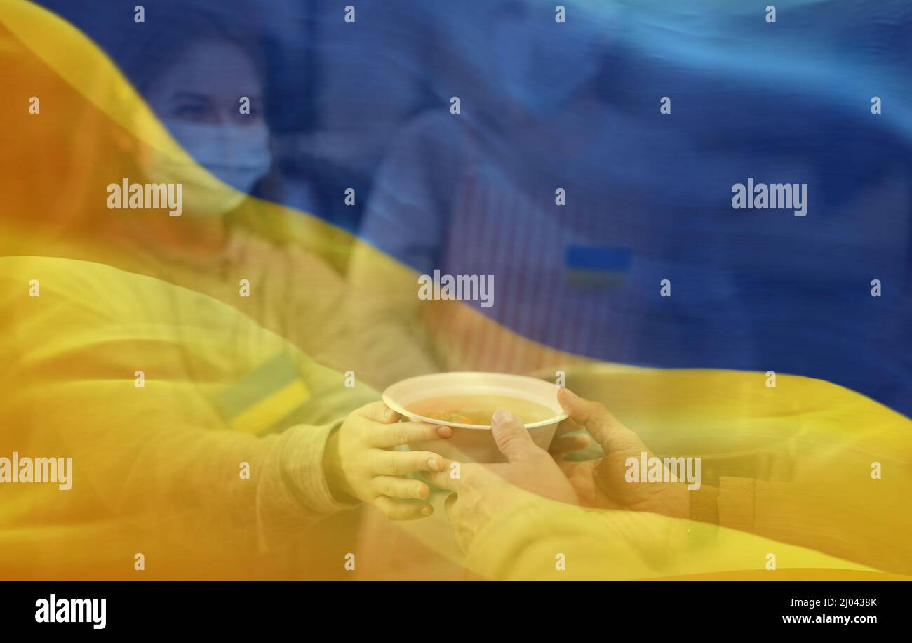 Double exposure of volunteers serving hot soup for Ukrainian migrants in refugee centre and Ukrainian flag Stock Photo