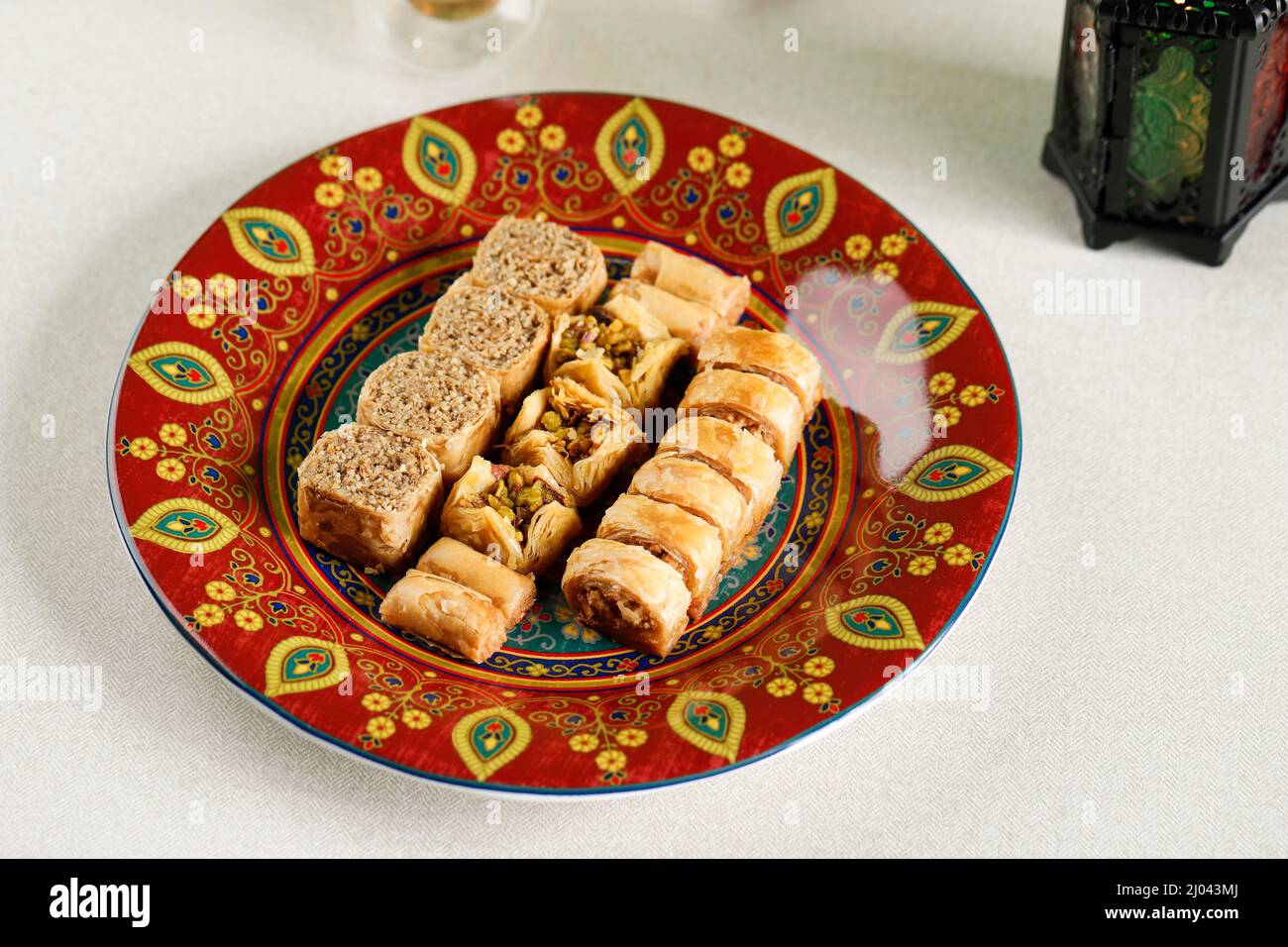 Mini Baklava Middle East Sweet on Moroccan Plate Stock Photo