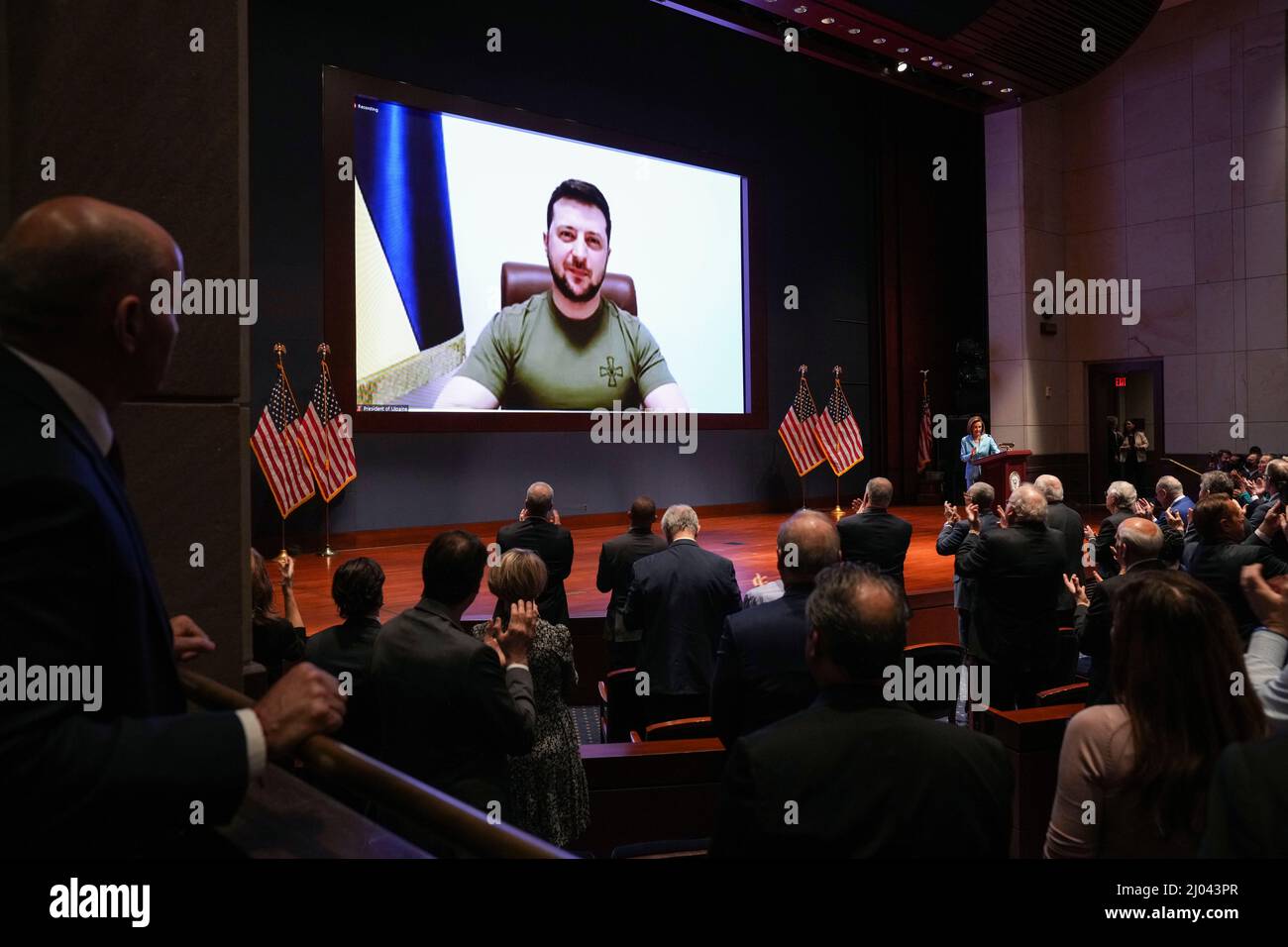 President Volodymyr Zelensky of Ukraine delivers a virtual address to ...