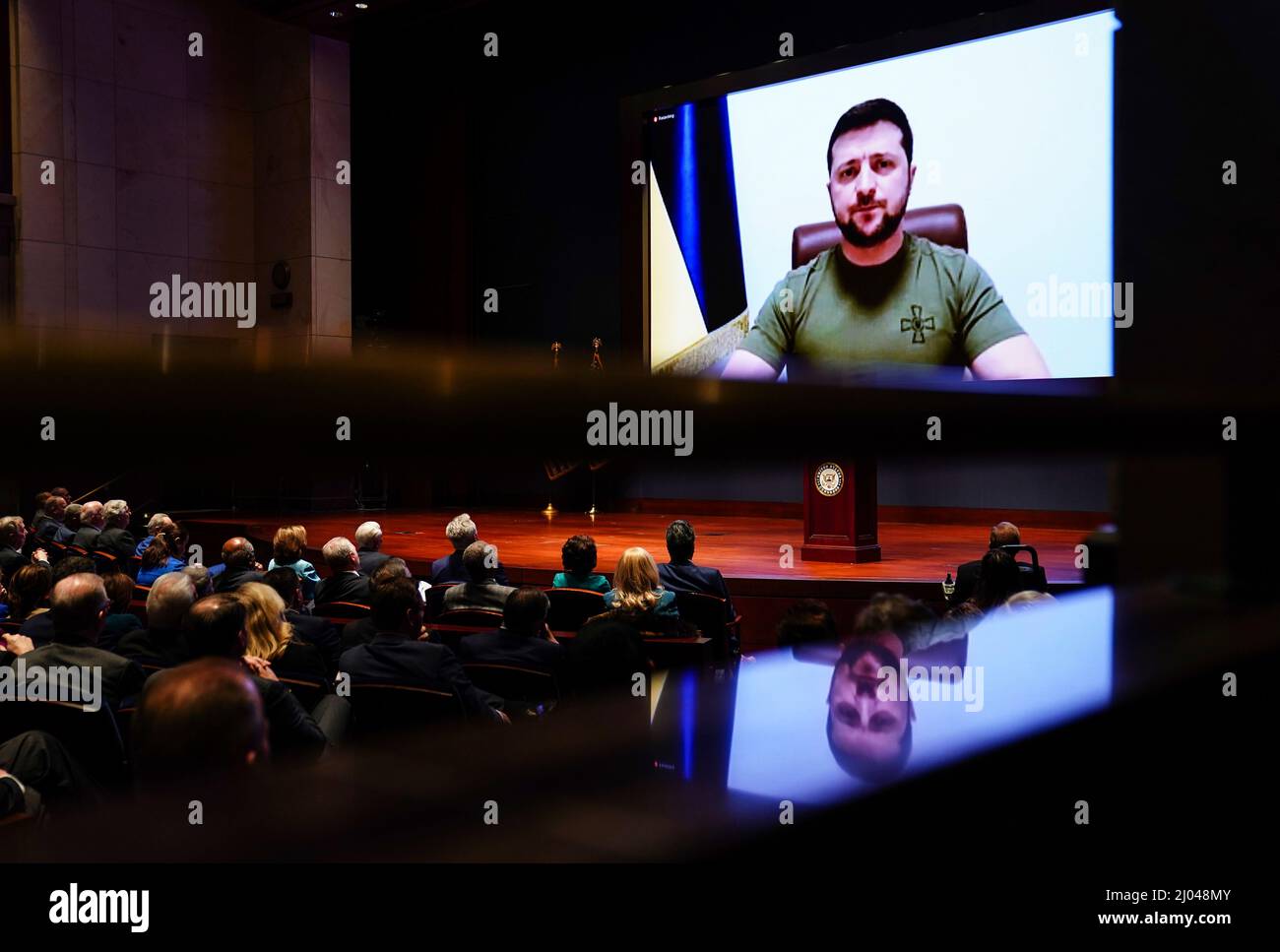 Washington, Vereinigte Staaten. 16th Mar, 2022. Ukraineï¿ s President Volodymyr Zelenskiy delivers a video address to senators and members of the House of Representatives gathered in the Capitol Visitor Center Congressional Auditorium at the U.S. Capitol in Washington, U.S., March 16, 2022. Credit: Sarah Silbiger/Pool via CNP/dpa/Alamy Live News Stock Photo