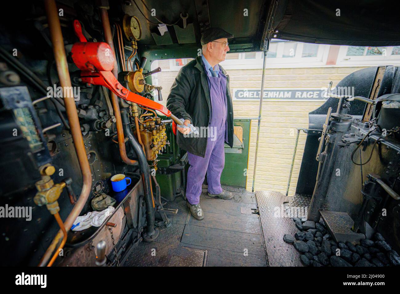 A train driver pulls past the Cheltenham races signal box on a special ...
