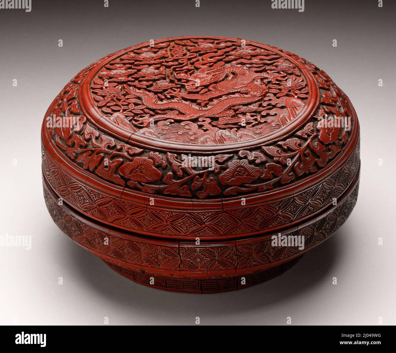 Box (He) with Dragon and Longevity (Shou) Character amid Clouds