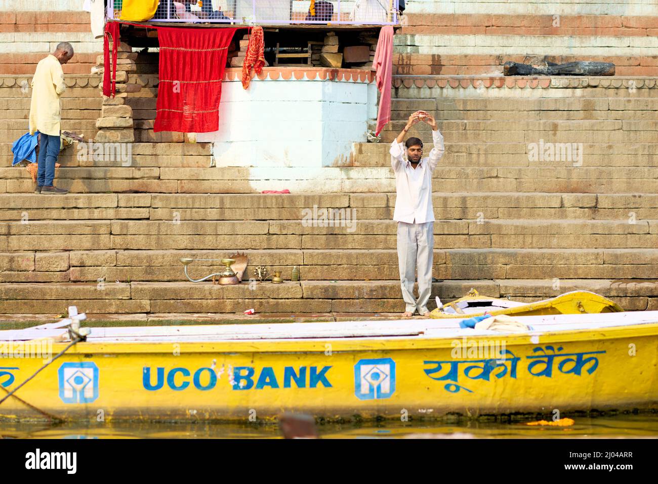 India. Varanasi Benares Uttar Pradesh. Sacred ablutions on the river Ganges Stock Photo