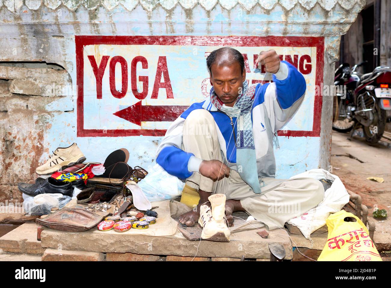 India. Varanasi Benares Uttar Pradesh. Shoemaker Stock Photo