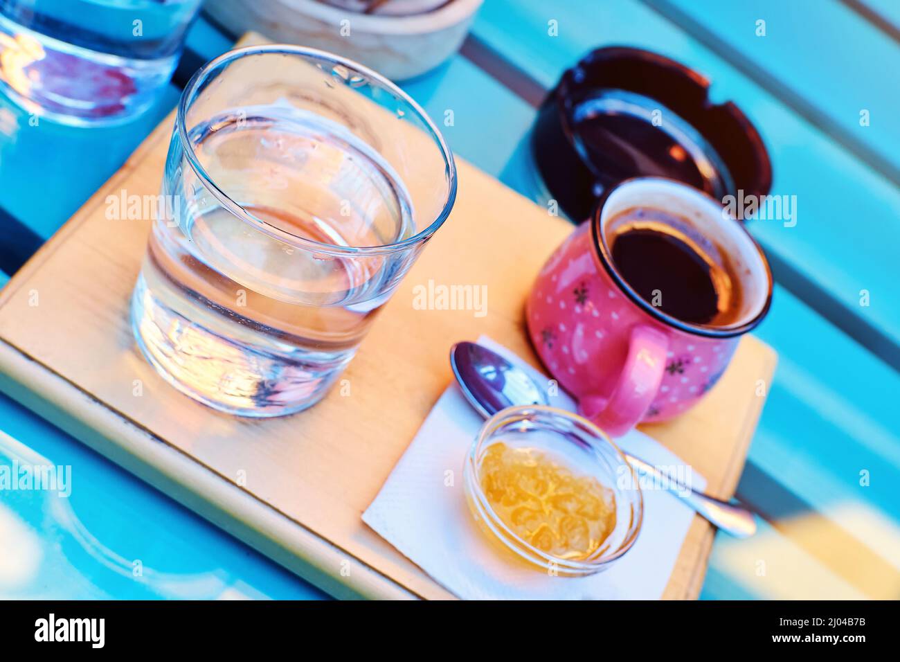 Angled view of colorful black coffee cafe set Stock Photo