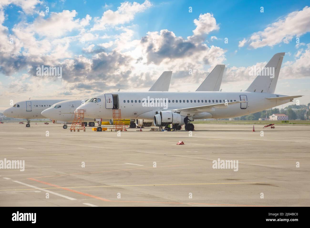 Three different types of aircraft lined up on the airport apron Stock Photo Alamy