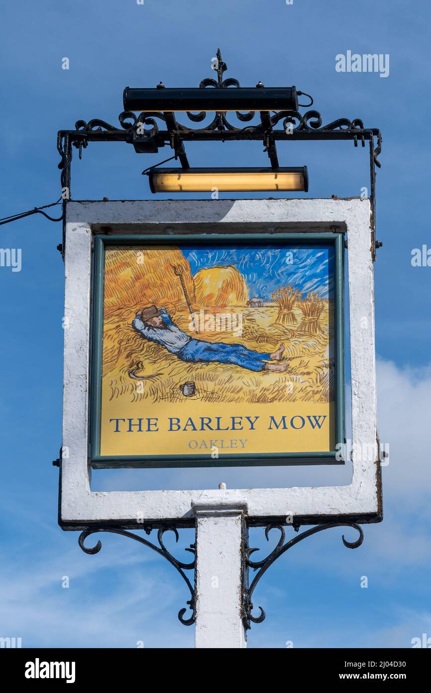 The Barley Mow pub sign in Oakley village in Hampshire, England, UK Stock Photo