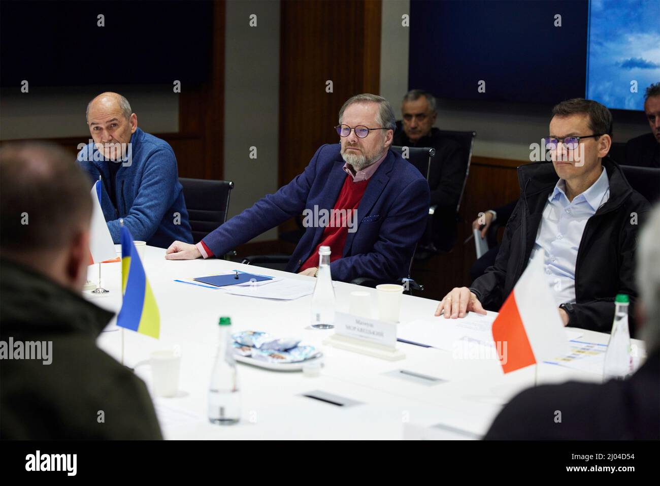 Kyiv, Ukraine. 15th Mar, 2022. Slovenian Prime Minister Janez Jansa, left, Czech Prime Minister Petr Fiala, center, and Polish Prime Minister Mateusz Morawiecki listen during a face-to-face meeting with Ukrainian President Volodymyr Zelenskyy, at a secure location March 15, 2022 in Kyiv, Ukraine. Credit: Ukraine Presidency/Ukraine Presidency/Alamy Live News Stock Photo
