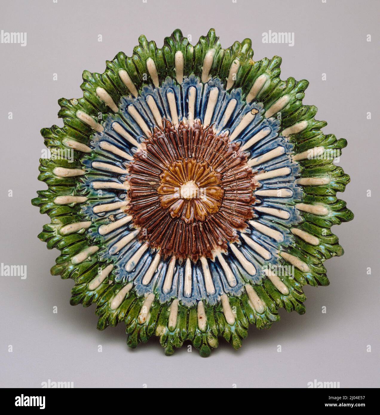 Shallow Bowl in a Flower Pattern. Palissy (after), Bernard (France, 1509–1590). France, circa 1560-1600. Furnishings; Serviceware. Lead-glazed earthenware, Palissy ware Stock Photo