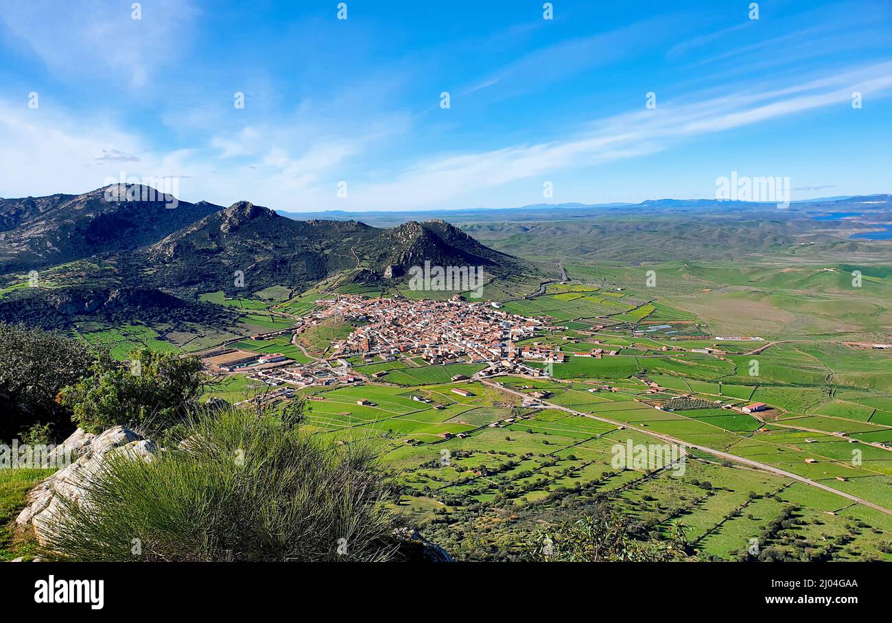 Horizontal photograph of a rural village in the mountains from high Stock Photo