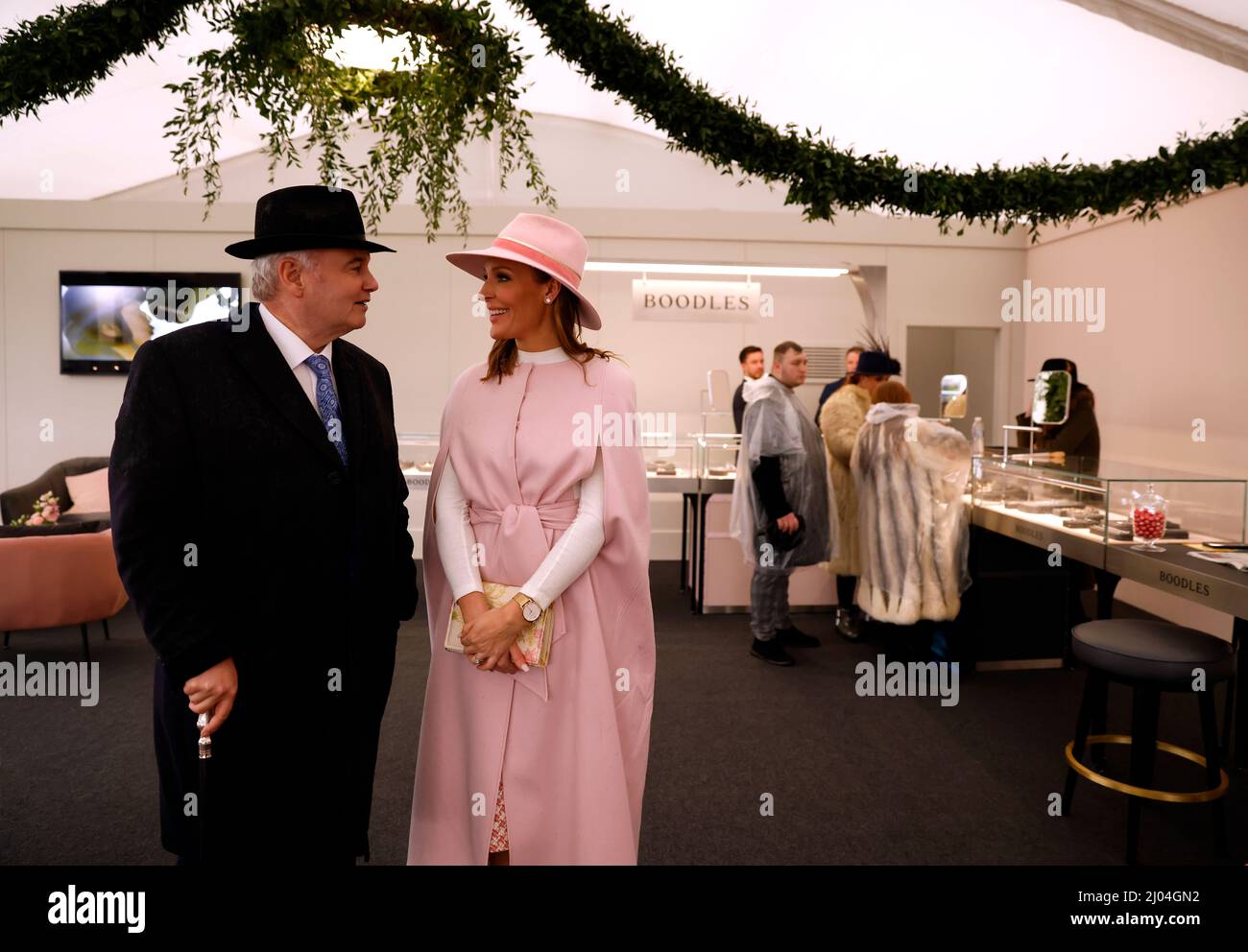 GB News Breakfast show presenters Eamonn Holmes and Isabel Webster during day two of the Cheltenham Festival at Cheltenham Racecourse. Picture date: Wednesday March 16, 2022. Stock Photo