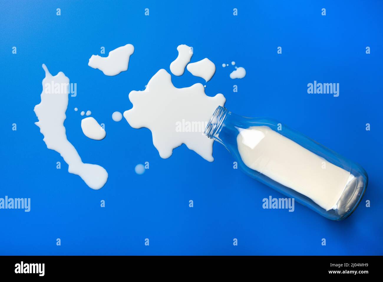 bad milk lactose intolerance allergy. milk bottle splatter. avoid