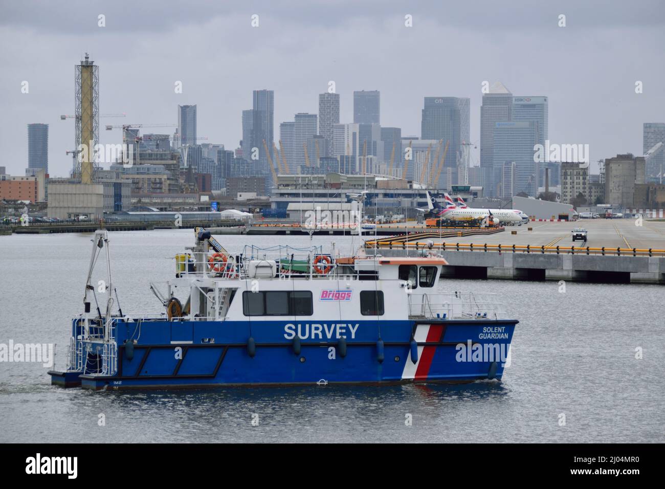 Briggs Marine's survey vessel SOLENT GUARDIAN passing through the KGV Dock in East London prior to attending the Oceanology International trade event Stock Photo