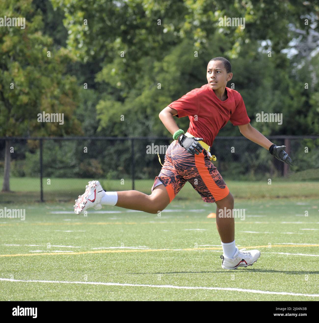 Football Player Running Stock Photo Alamy
