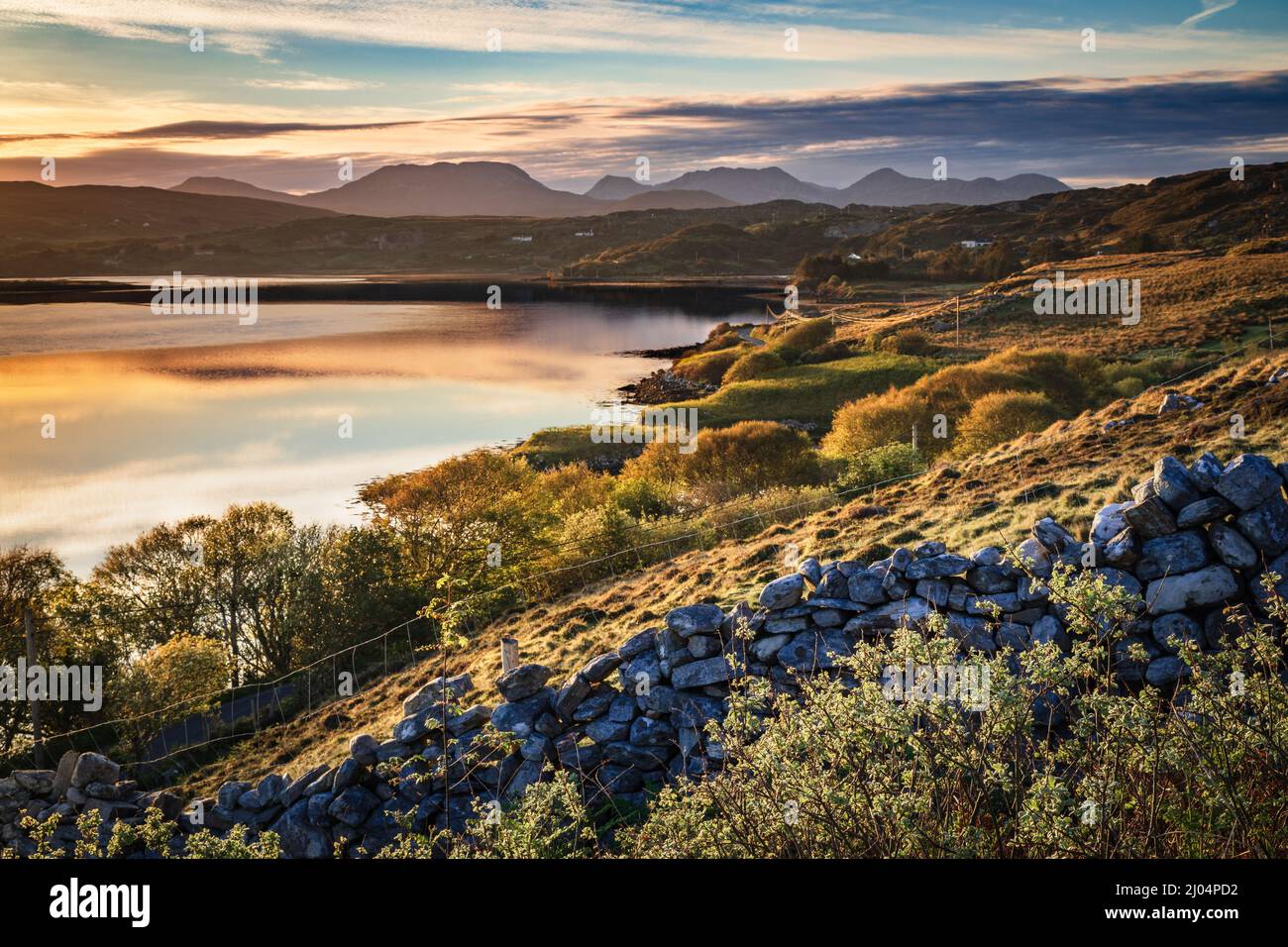 View along the south shore of Streamstown Bay to The Twelve Bens