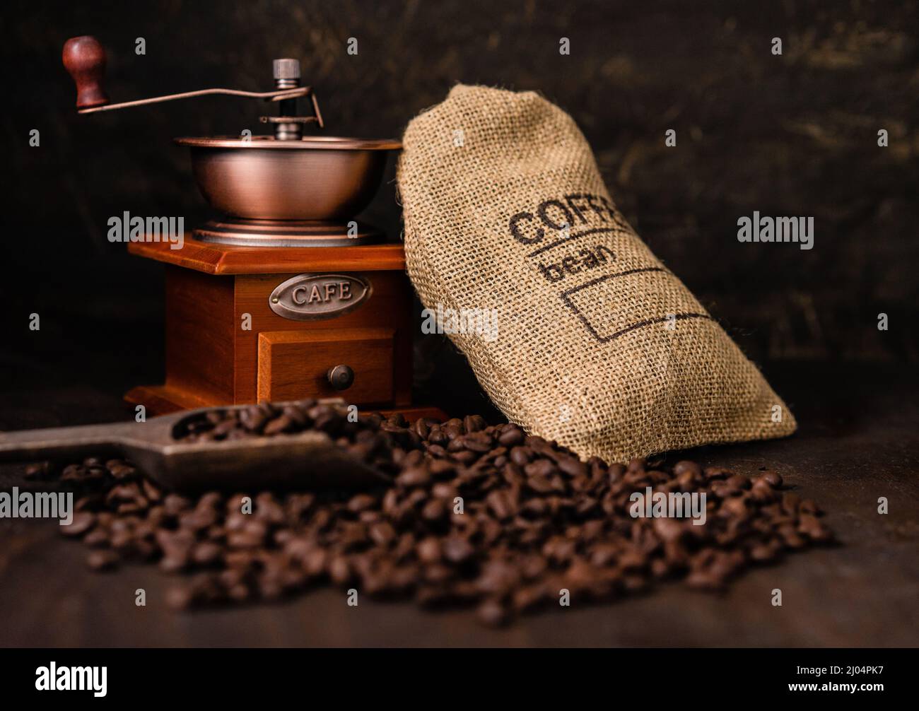 Coffee bean in bag, coffee grinder with scoop Stock Photo