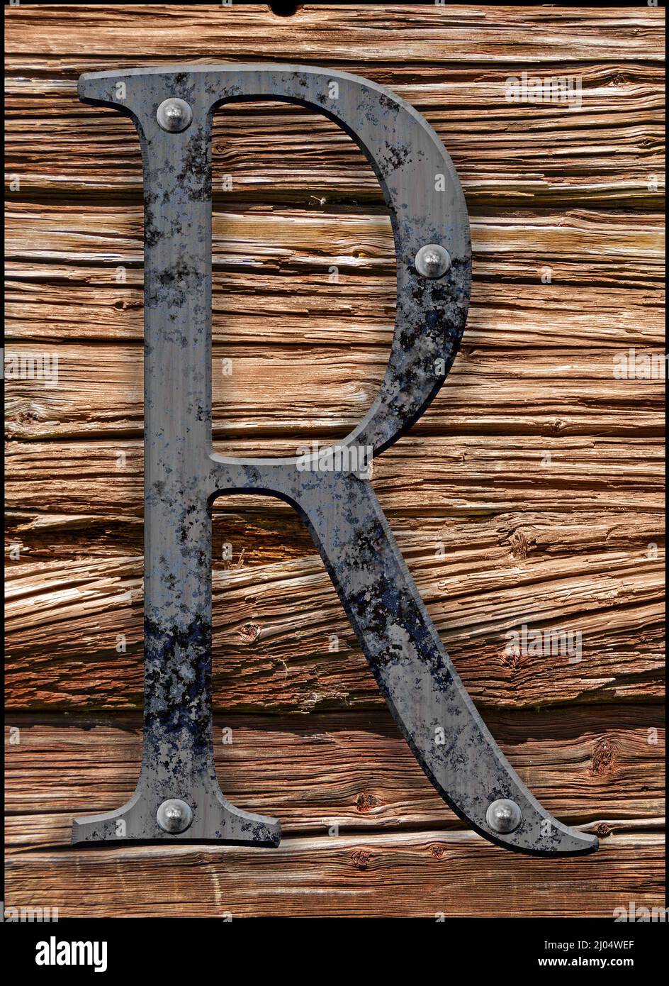 Iron letter R on old wood Stock Photo - Alamy