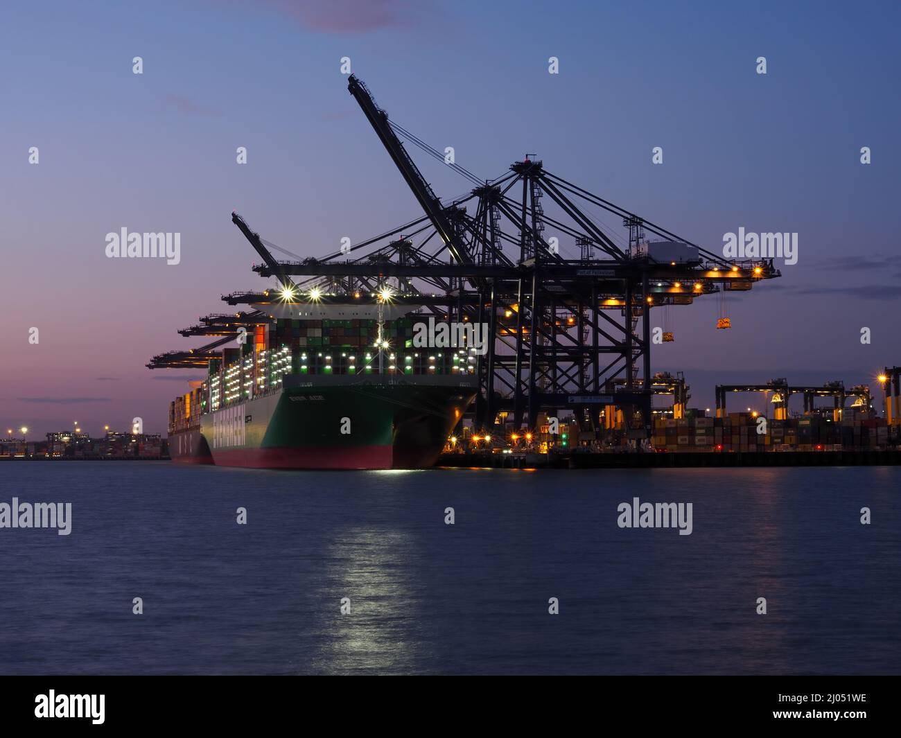 Port of Felixstowe, cranes loading containers onto the Ever Ace container ship Stock Photo