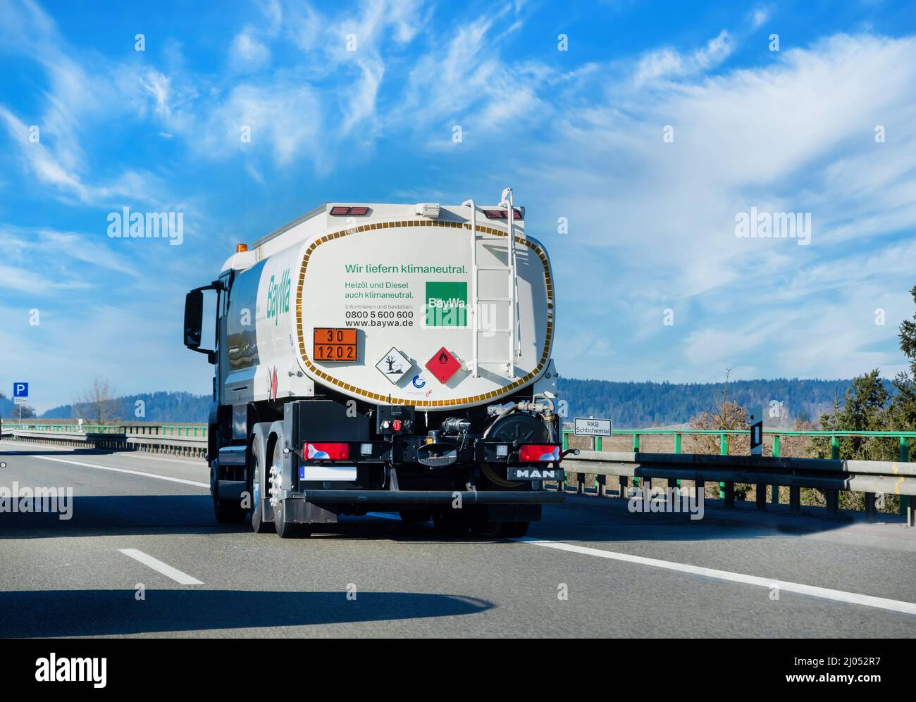 Germany 2022: Truck with tank for fuel oil and diesel on the highway Stock Photo