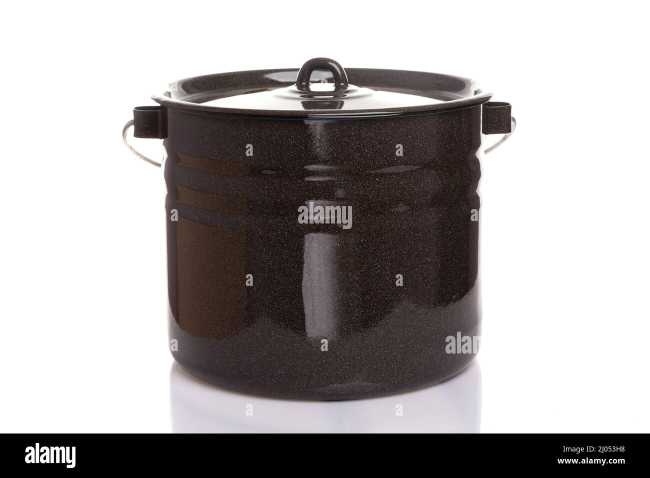 a large household metal pan of brown color with a lid on a white