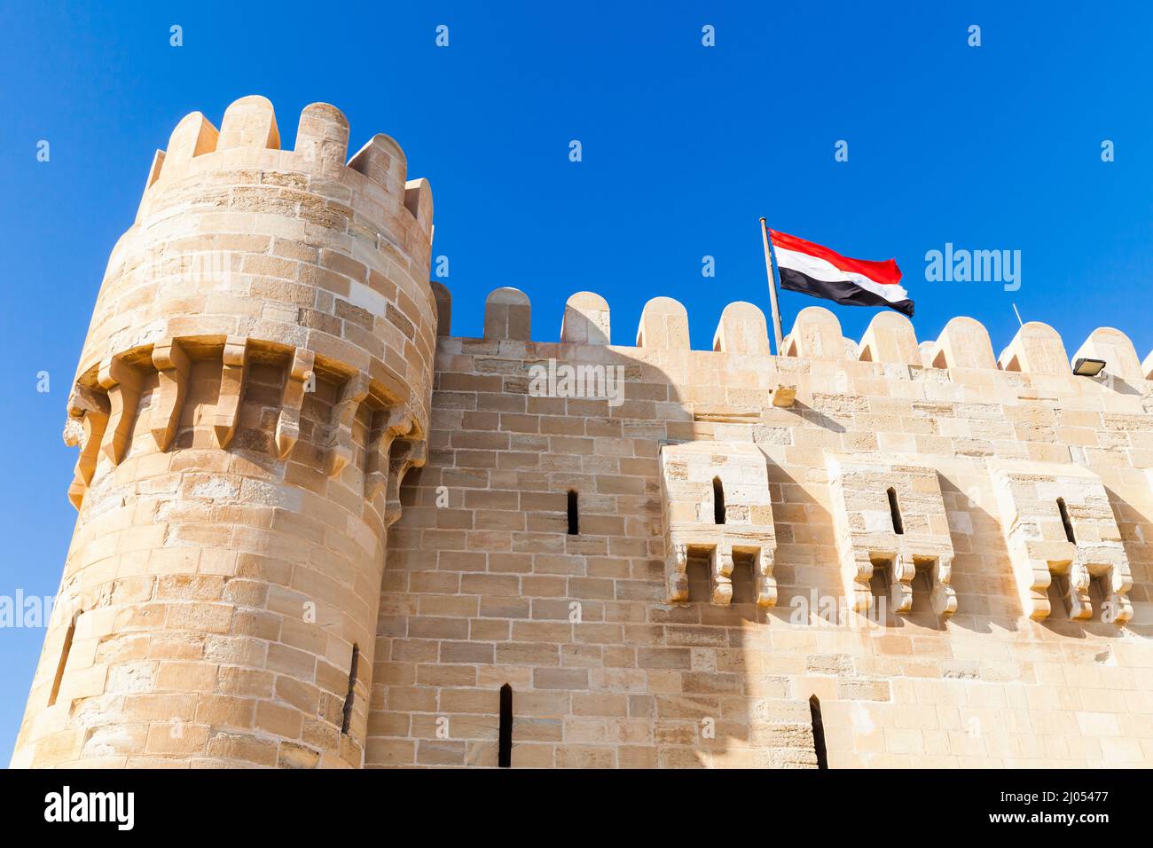Alexandria, Egypt. Facade of the Citadel of Qaitbay or the Fort of Qaitbay, 15th-century defensive fortress located on the Mediterranean sea coast. It Stock Photo