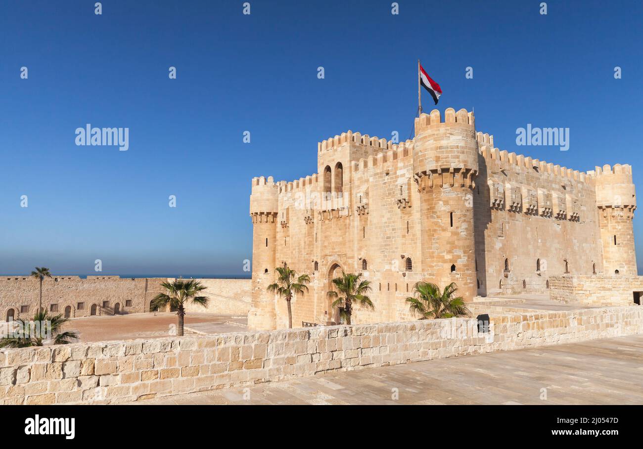 The Citadel of Qaitbay or the Fort of Qaitbay. It is a 15th-century defensive fortress located on the Mediterranean sea coast Stock Photo