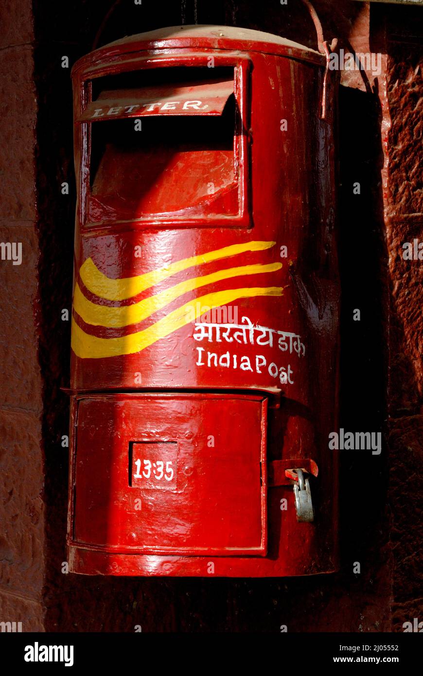 Amreli Gujarat india  Sep. 30 2009  Close up of Traditional red color old Indian mailbox or postbox Letter box at Amreli railway station. Stock Photo