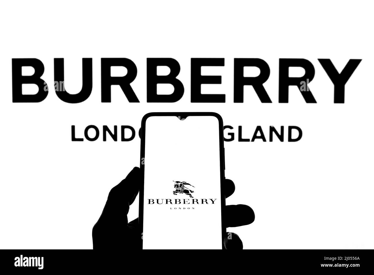 Spain. 11th Mar, 2022. In this photo illustration a Burberry logo seen displayed on a smartphone with a Burberry logo in the background. (Credit Image: © Thiago Prudencio/SOPA Images via ZUMA Press Wire) Stock Photo